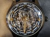a close up of a watch on a wrist