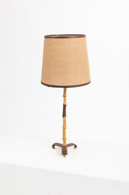 Jacques ADNET (1900-1984) Lampe à fut en bambou reposant sur… - Photo 1