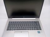 a laptop computer that is sitting on a table