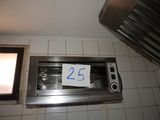 a picture of a toaster oven with a sign on it