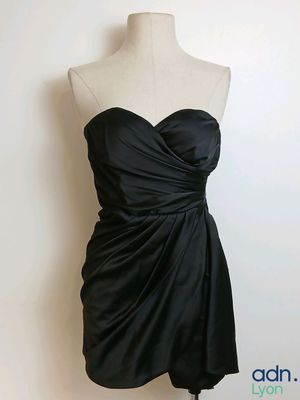 strapless black cocktail dress on a mannequin dummy