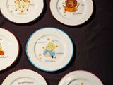 six plates with different designs on them on a table