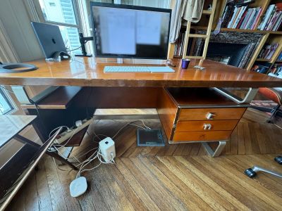 an image of a desk with a computer on it
