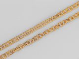 une paire de bracelets à chaîne en or