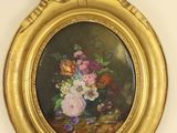a picture of a picture of a vase of flowers on the wall