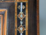a close up of a picture of a wooden frame