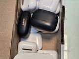 a box with some airpods in it on a table