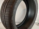 a close up of a tire on a white surface