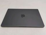 an apple macbook pro laptop computer sitting on a white surface