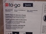 a box with a label on it that says to go jura