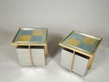 pair of mid - century modern side tables with glass tops