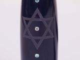 a black and silver vase with a star of david on it