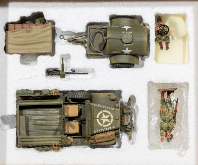 a picture of a toy army vehicle in a box