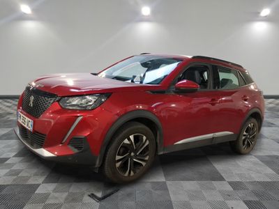 a red suv parked in a room with a checkered floor