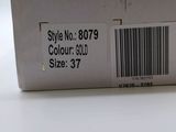 a white box with a barcode on it sitting on a table
