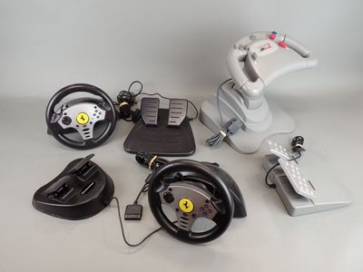 a lot of different types of racing wheels and remote controls
