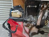 an image of a pile of tools in a garage