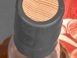 a close up of a bottle of liquor on a table