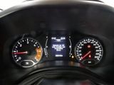 a close up of a car dashboard with various gauges
