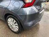 a car that is parked on the side of the street