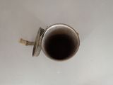 a coffee cup that is sitting on a table
