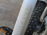 a close up of a bike with a sticker on it