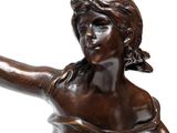 statue of a woman holding a tennis racquet on a white background