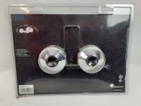 pair of chrome plated door knobs in packaging on white background