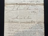 a piece of paper with writing on it sitting on a table