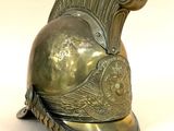 casque d'un guerrier romain orné d'une plume sur le côté