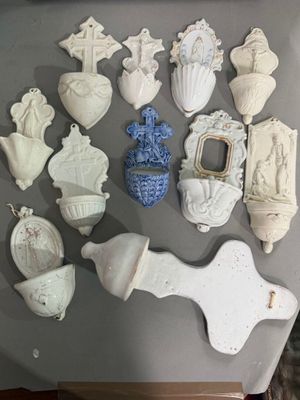 a lot of white and blue ceramic items on the table