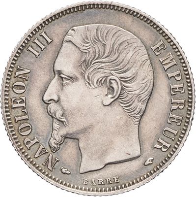Gros plan sur une pièce de monnaie portant le visage d'un homme