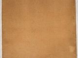 an old piece of brown paper with a small hole in the middle of it
