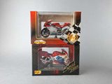 a box with a motorcycle in it on a table