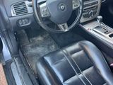 the interior of a car with a steering wheel, dashboard, and dash board