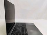 an open laptop computer sitting on top of a white table
