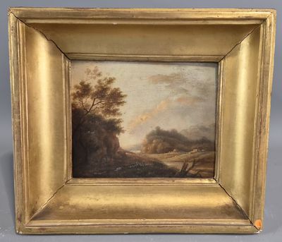 a painting of a landscape in a gold frame on a grey background