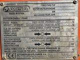 a close up of a metal sign on a machine