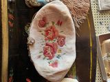 a purse that has a bunch of flowers on it