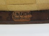 an image of a close up of a chair with a label on it