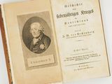 an old book with a picture of a man on it
