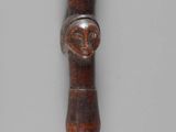 two spoons that are sitting on a table