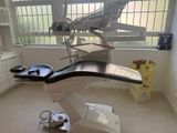 an image of a dentist ' s chair in a room