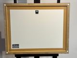 a picture of an easel with a picture on it