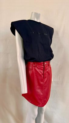 red leather skirt with black shirt on mannequin mannequin mannequin mannequin mannequin mannequin mannequin mannequin mann