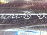a close up of a black car with writing on it