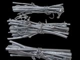 several pieces of metal wire are tied together on a black background