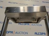a close up of a metal object on a metal stand