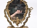 a person taking a picture of themselves in a mirror