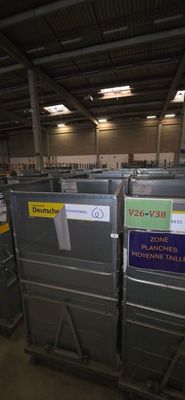 many boxes of electronic equipment in a warehouse